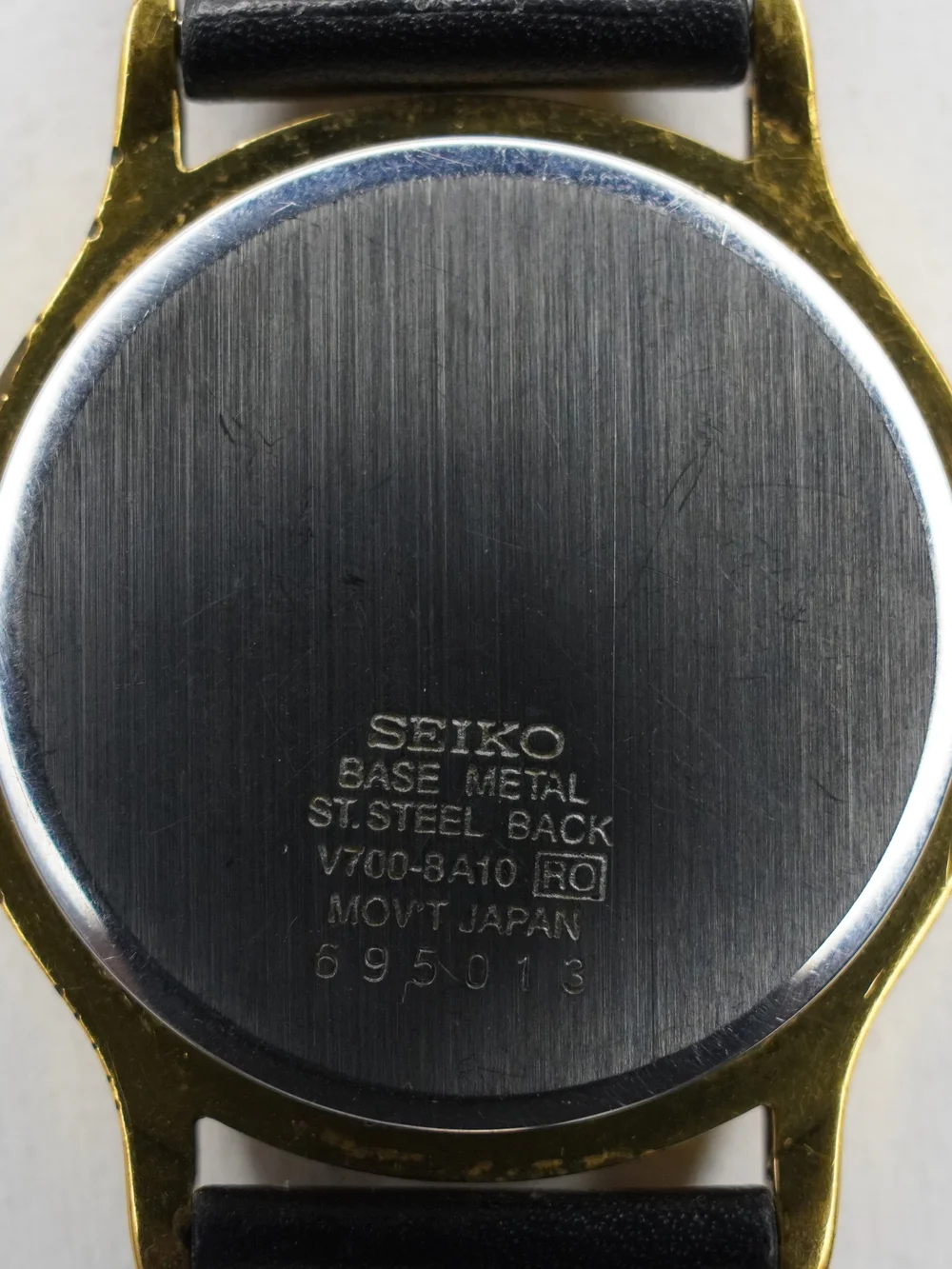 Vintage Seiko 1990s V700-8A10 Quartz Gold-Tone White Dial Roman Numerals Watch